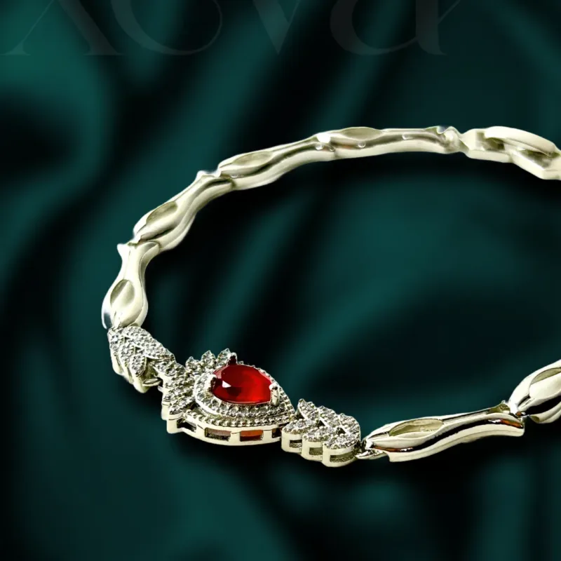 Silver bracelet with red stone